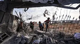 Badan khusus Perserikatan Bangsa-Bangsa (PBB) yang berfokus pada masalah kesehatan masyarakat internasional, World Health Organization (WHO), menyebut bahwa kasus meningitis pada anak di Gaza mengalami kenaikan. (Eyad BABA/AFP)