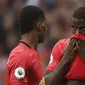 Pemain Manchester United, Marcus Rashford dan Paul Pogba. (AFP/Oli Scarff)