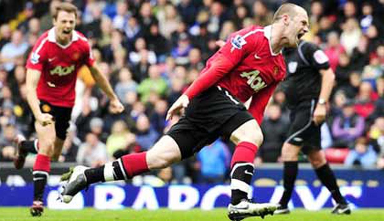 Selebrasi gol striker Manchester United Wayne Rooney ke gawang Blackburn Rovers dalam lanjutan Liga Premier, 14 Mei 2011. AFP PHOTO/GLYN KIRK