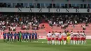 Klub Prancis lainnya, AC Ajaccio dan Clermont Foot 63 juga melakukan mengheningkan cipta untuk para korban tragedi Kanjuruhan yang banyak memakan korban jiwa. (AFP/Pascal Pochard-Casabianca)