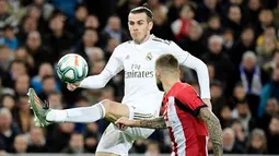 Gareth Bale - Bersama Benzema dan Cristiano Ronaldo mereka membentuk trio BBC yang fantastis dan membawa Real Madrid berjaya di Liga Champions. Bale sendiri telah membukukan 16 gol dalam 55 pertandingan Liga Champions bersama Los Blancos. (AFP/Javier Soriano)