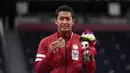 Fredy Setiawan menambah koleksi medali Indonesia di Paralimpiade Tokyo 2020. Atlet Indonesia itu mempersembahkan medali perunggu dari cabang olahraga para bulutangkis nomor tunggal putra kategori SL4. (Foto: AP/Kiichiro Sato)