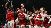 Arsenal berhasil memetik poin penuh saat bertandang ke markas Tottenham Hotspur dalam laga pekan ke-28 Liga Inggris 2025/2026 pada Minggu (22/02/2026) waktu setempat. (AFP/Glyn Kirk)