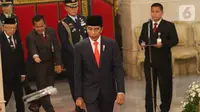 Presiden Joko Widodo bersiap melantik para Wakil Menteri (Wamen) Kabinet Indonesia Maju di Istana Negara, Jumat (25/10/2019). Jokowi melantik 12 wakil menteri yang akan membantu jajaran menteri Kabinet Indonesia Maju dalam menjalani roda pemerintahan 5 tahun ke depan. (Liputan6.com/Angga Yunair)