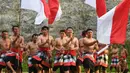 Para penari menampilkan tarian tradisional dalam perayaan memperingati Hari Ulang (HUT) ke-78 Republik Indonesia di Taman Budaya Garuda Wisnu Kencana, Jimbaran, Bali, Kamis (17/8/2023). (SONNY TUMBELAKA/AFP)