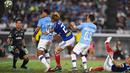 Striker Manchester City, Lukas Nmecha, berusaha membobol gawang Yokohama Marinos pada laga pramusim di Stadion Yokohama, Jepang, Sabtu (27/7). Yokohama kalah 1-3 dari City. (AFP/Charly Triballeau)
