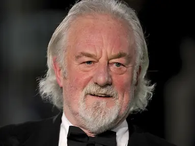Kabar duka datang dari dunia sinema Hollywood, bahwa Bernard Hill meninggal dunia. Aktor film Titanic dan Lord of The Rings itu meninggal dunia pada Minggu (5/5) dini hari dalam usia 79 tahun. (Dominic Lipinski/PA via AP)