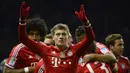 Toni Kroos. Ia hampir saja berseragam Manchester United usai lepas dari Bayern Munchen di akhir musim 2013/2014. Manajer Setan Merah saat itu, David Moyes telah mencapai kata sepakat untuk memboyongnya. Sayang, Moyes keburu dipecat dan digantikan Louis van Gaal. (Foto: AFP/Odd Andersen)