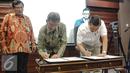 Kantor Staf Presiden dan Badan Pengawasan Keuangan dan Pembangunan (BPKP) menandatangani nota kesepahaman pengawasan serta pengendalian program prioritas nasional di Gedung Bina Graha, Jakarta, Jumat (10/7/2015). (Liputan6.com/Faizal Fanani)