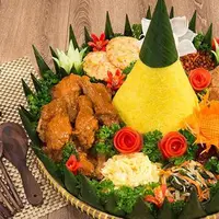 Ilustrasi nasi tumpeng/credit: Liputan6.com/indochili.com