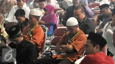 Suasana Sidang Pleno III Muktamar NU 33 yang digelar di Alun-alun Jombang, Jawa Timur, Rabu (5/8/2015). Sejumlah peserta terlihat tertidur saat mengikuti Sidang pleno III Muktamar NU 33. (Liputan6.com/Johan Tallo)