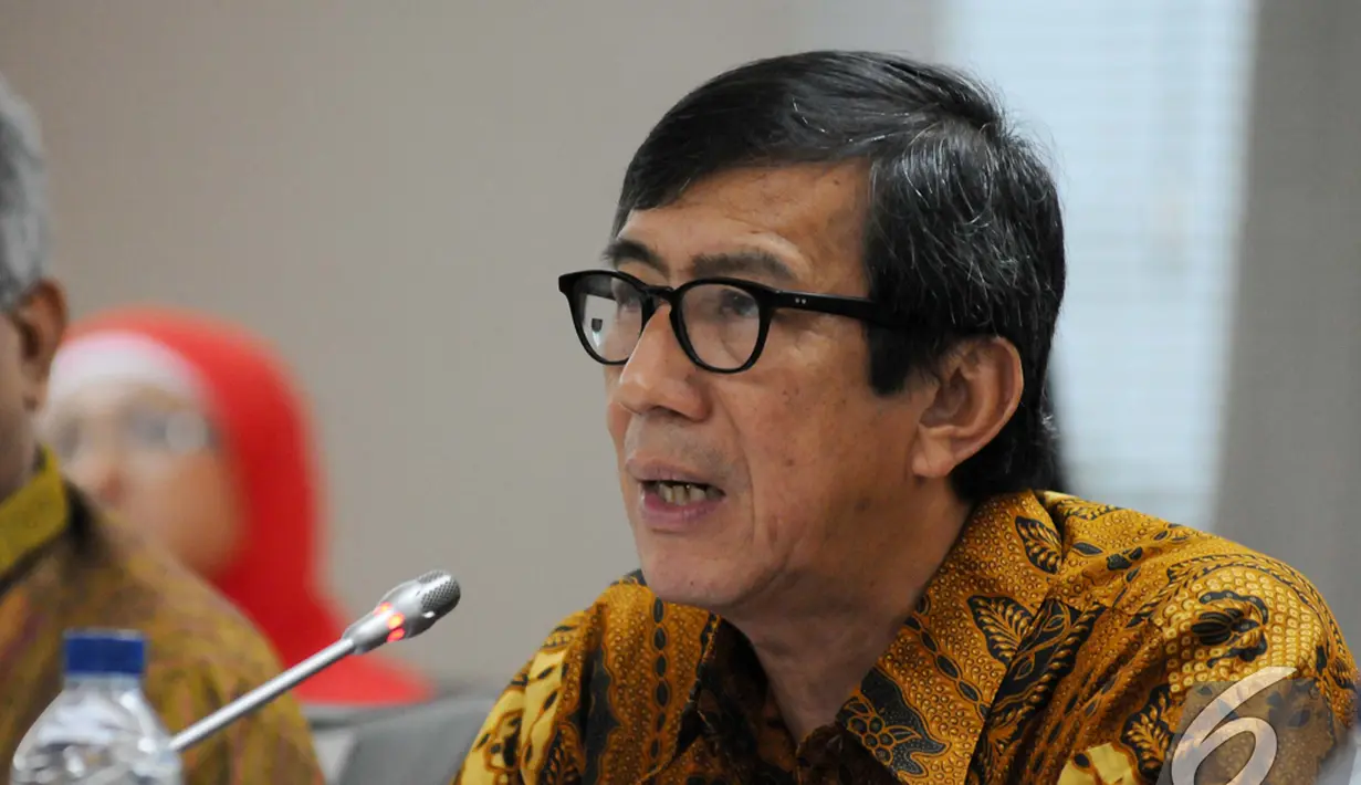 Menteri Yasonna Hamonangan Laoly saat Rapat Kerja dengan Komite I DPR RI, Senayan, Jakarta, Kamis (20/11/2014). (Liputan6.com/Andrian M Tunay)