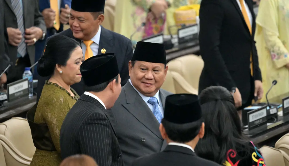 Presiden Indonesia Prabowo Subianto saat tiba menghadiri Sidang Tahunan MPR RI dan Sidang bersama DPR dan DPD RI tahun 2026 di Gedung Nusantara, Kompleks Parlemen, Senayan, Jakarta, Jumat, 14 Agustus 2026. (AFP/ Bay Ismoyo)