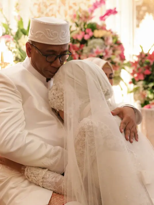 Ben dan Nesyana resmi menjadi suami istri setelah resmi menjalani akad nikah pada Sabtu (30/7/2016), di Ballroom The Ritz Carlton, Jakarta Selatan.  (Adrian Putra/Bintang.com)