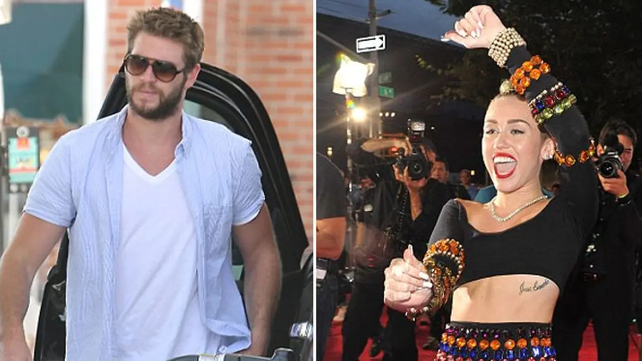 miley-cyrus-liam-hemsworth-130830c.jpg