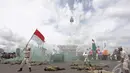 Aksi teatrikal melumpuhkan tentara Belanda dalam pameran alutsista TNI AD di kawasan Monas, Jakarta, Jumat (12/12/2014)  (Liputan6.com/Faizal Fanani)