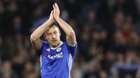 John Terry adalah kapten paling sukses dalam sejarah Chelsea. Ia juga mampu memainkan pertahanan kokohnya untuk merebut gelar-gelar bergengsi. Terry menjadi pembuat penampilan tertinggi ketiga (717) dalam sejarah klub sebelum meninggalkan The Blues pada 2017. (AFP/Adrian Dennis)