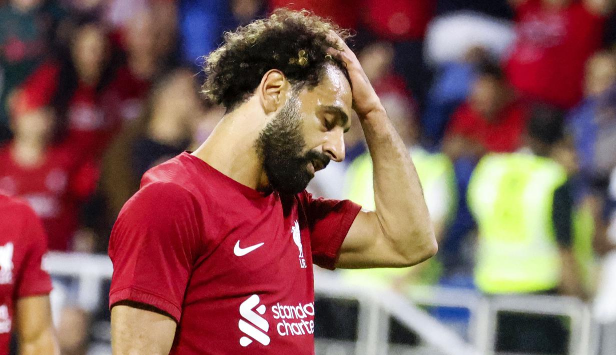 Liverpool dipaksa menyerah dengan skor 1-3 kala menghadapi Lyon dalam laga Dubai Super Cup yang digelar di Al Maktoum Stadium, Dubai, Minggu (11/12/2022). (AFP/Karim Sahib)