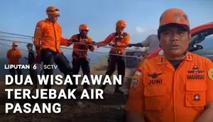 Dua Wisatawan Terjebak Air Pasang