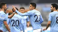 Pemain Manchester City Joao Cancelo (tengah) melakukan selebrasi usai mencetak gol ke gawang Newcastle United pada pertandingan Liga Inggris di Stadion St James' Park, Newcastle, Inggris, Jumat (14/5/2021). Hattrick Ferran Torres membawa Manchester City menang 4-3. (Stu Forster/Pool via AP)