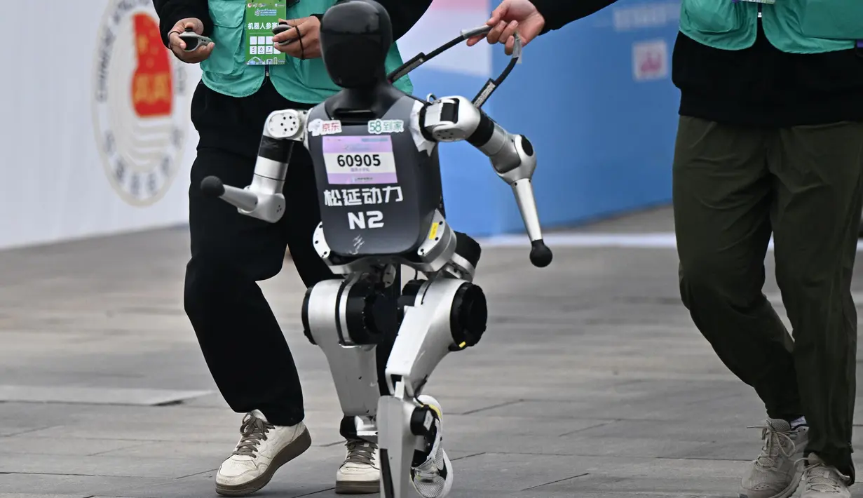 Ajang ini sekaligus menunjukkan tekad China untuk memimpin perlombaan global dalam teknologi mutakhir robot humanoid. (Pedro PARDO/AFP)