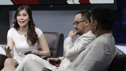 Terjunnya Dini ke dunia presenter olahraga bukan tanpa alasan. Wanita asal Banten ini memang dikenal sebagai seorang fans berat Liverpool. (Bola.com/M Iqbal Ichsan)