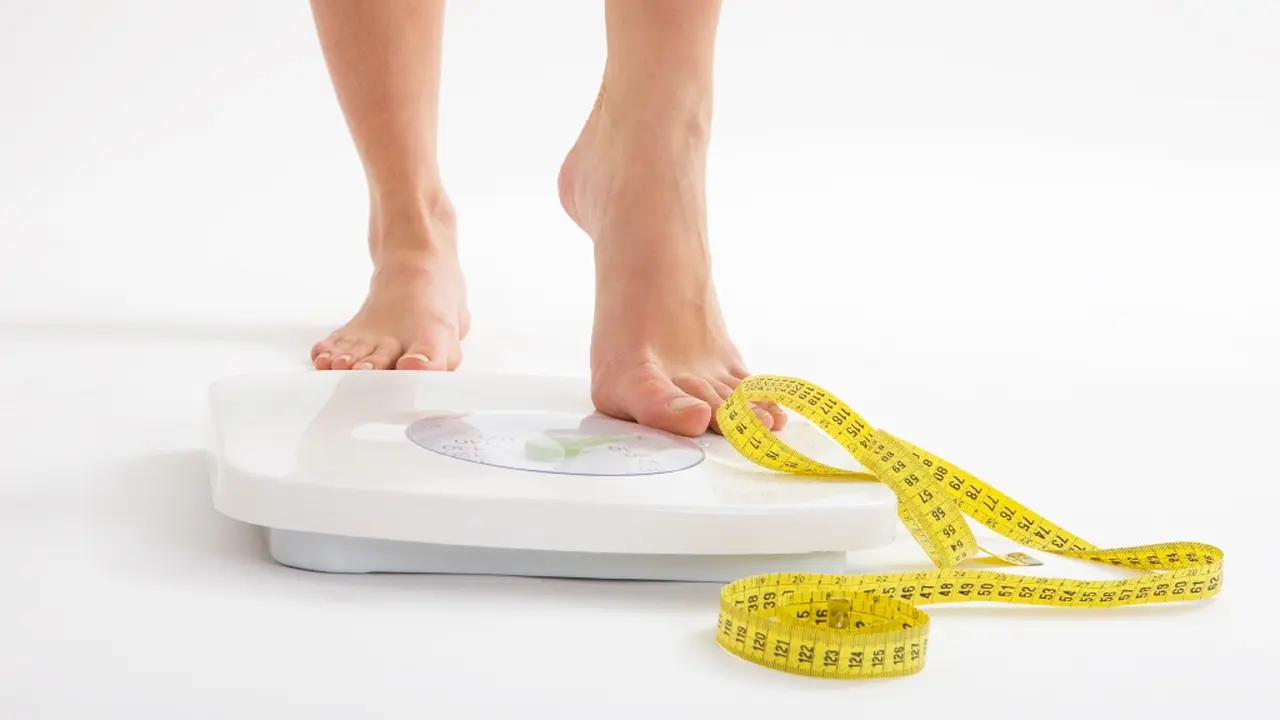 Menimbang Berat Badan