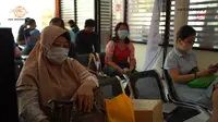 (Foto: Tangkapan layar vidio.com berjudul Pos Indonesia Salurkan BST Tahap 9 di Kota Manado)