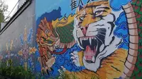 PT ICI Paints Indonesia tengah aktif berpartisipasi dalam memberdayakan desa dan kampung wisata di Indonesia melalui program bernama "Let's Colour", dengan mengubah kawasan kumuh menjadi daerah potensi ekonomi. (dok. PT ICI Paints Indonesia)