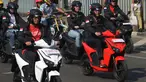 Menteri Perhubungan Budi Karya Sumadi (kiri) dan Menteri Koordinator Bidang Kemaritiman Luhut Binsar Pandjaitan melakukan konvoi kendaraan bermotor listrik (KBL) melintasi kawasan MH Thamrin menuju Bundaran HI, Jakarta, Sabtu (31/8/2019). (merdeka.com/Imam Buhori)