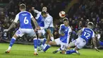 Pemain Manchester City Jack Grealish (tengah) menendang bola saat melawan Peterborough United pada pertandingan sepak bola putaran kelima Piala FA di Stadion Weston Homes, Peterborough, Inggris, 1 Maret 2022. Manchester City menang 2-0. (AP Photo/Rui Vieira)