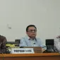 Ketua DPRD DKI Jakarta Prasetio Edi Marsudi bersama wakil Ketua DPRD Abraham Lunggana dan M Taufik memberikan keterangan pers di Gedung DPRD, DKI Jakarta, Kamis (5/3/2015). (Liputan6.com/Herman Zakharia)