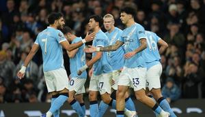 Skuad Manchester City merayakan gol Nico O'Reilly ke gawang Newcastle di pekan ke-27 Liga Inggris 2025/2026 di Etihad Stadium, Minggu (22/02/2026) dini hari WIB. (AP Photo/Jon Super)