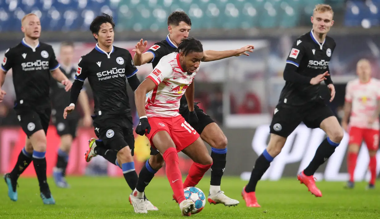 Nkunku saat ini berstatus pemain paling subur di Leipzig dengan mengemas 30 gol serta 18 assist di semua kompetisi. Koleksi gol dan assist Nkunku melampaui catatan gol dan assist Ronaldo serta Messi. (AFP/ Ronny Hartmann)