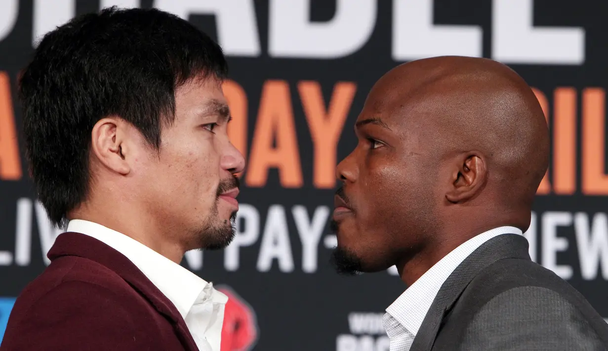 Petinju asal Filipina Manny Pacquiao berhadapan dengan Timothy Bradley saat jumpa pers pengumuman resmi pertarungan mereka di Beverly Hills, California, USA (19/1/2016). Pacquiao memutuskan pensiun usai melawan Bradley 9 April 2016. (AFP/CHRIS FARINA)