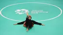 Pesilat Indonesia, Puspa Arumsari, saat beraksi pada Asian Games di Arena Silat TMII, Jakarta, Senin (27/8/2018). Puspa meraih medali emas kelas seni kategori tunggal putri dengan nilai 467. (Merdeka.com/Arie Basuki)