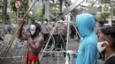 Massa yang tergabung dalam Aliansi Mahasiswa Papua saat menggelar aksi di kawasan Patung Kuda, Jakarta, Senin (16/11/2020). Mahasiswa menolak operasi Blok Wabu bekas PT Freeport Indonesia, perpanjangan otonomi khusus Papua yang berakhir 2021, dan UU Cipta Kerja. (Liputan6.com/Faizal Fanani)