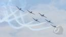 Tim Jupiter Aerobatic TNI AU beraksi dalam peringatan Hari Ulang Tahun ke-69 TNI AU Tahun 2015 di Pangkalan Udara Halim Perdanakusuma, Jakarta, Kamis (9/4/2015). Acara tersebut menampilkan demo darat dan atraksi udara. (Liputan6.com/Herman Zakharia)