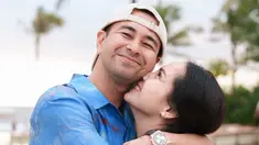 Raffi Ahmad mengenakan kemeja bermotif sementara Nagita memakai baju berwarna hijau. (Foto: Instagram/ raffinagita1717)