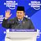 Hal itu dipaparkan Presiden Prabowo saat berpidato pada pertemuan tahunan Forum Ekonomi Dunia (WEF) di Davos, Swiss, pada Kamis 22 Januari 2026. Tampak dalam foto, Presiden Indonesia, Prabowo Subianto mengangkat tangan saat menyampaikan pidato khusus (special address) pada pertemuan tahunan Forum Ekonomi Dunia (WEF) di Davos, Swiss, pada Kamis 22 Januari 2026. (Fabrice COFFRINI/AFP)