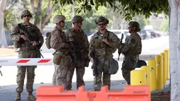 Ratusan personel Marinir Amerika Serikat (AS) diterjunkan ke Los Angeles. Penempatan ini merupakan bagian dari perintah langsung Presiden Amerika Serikat (AS) Donald Trump. (ETIENNE LAURENT/AFP)
