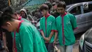 Empat tersangka dihadirkan saat rilis kasus pengungkapan narkotika jaringan Internasional Malaysia-Indonesia di Polres Jakarta Barat, Selasa (16/7/2019). Sejumlah barang barang bukti diantaranya 30 paket besar jenis sabu denga berat Brutto 30.000 Gram berhasil diamankan. (Liputan6.com/Faizal Fanani)