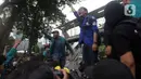 Pengunjuk rasa meminta pemerintah melakukan evaluasi terhadap kebijakan Makan Bergizi Gratis. (Liputan6.com/Helmi Fithriansyah)