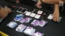 Polisi menunjukkan barang bukti kasus order fiktif pada transportasi online saat rilis di Polda Metro Jaya, Jakarta, Rabu (13/2). Polisi membekuk keempat tersangka di salah satu ruko di Jakarta Barat. (Liputan6.com/Faizal Fanani)