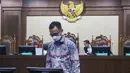 Bekas Ketua Pengadilan Negeri Jakarta Selatan, yang pernah menjabat Wakil Ketua Pengadilan Negeri Jakarta Pusat, Muhammad Arif Nuryanta saat menjalani sidang pembacaan dakwaan di Pengadilan Tindak Pidana Korupsi (Tipikor) Jakarta, Rabu (20/8/2025). (merdeka.com/Arie Basuki)