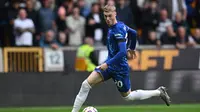 Aksi Cole Palmer saat membela Chelsea melawan Wolverhampton Wanderers pada lanjutan Liga Inggris 2024/2025, Minggu (25/8/2024). (JUSTIN TALLIS / AFP)