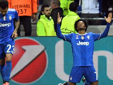 Juventus susah payah taklukkan Olympique Lyon 1-0 dalam laga Grup H Liga Champions di Stade de Lyon, Prancis, Rabu (19/10/2016) dini hari WIB. Gol tunggal Juventus dicetak Juan Cuadrado. (AFP/Philippe Desmazes)