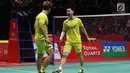 Kevin Sanjaya Sukamuljo/Marcus Fernaldi berselebrasi usai mencetak poin melawan Li Junhui/Liu Yuchen (China) di babak final Indonesia Masters 2018, Minggu (28/1). Kevin/Marcus mempersembahkan gelar juara Indonesia Masters 2018. (Liputan6.com/Angga Yuniar)