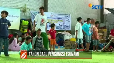 Jelang tahun baru ratusan orang korban tsunami Banten masih bertahan di pengungsian. Sementara proses evakuasi masih terus dilakukan.