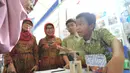 Murid SDN Puspiptek menjelaskan cara kerja dongkrak hidrolik ciptaannya   saat kegiatan Puspiptek Innovation Festival (PIF) 2018 di kawasan Puspiptek, Setu, Tangerang Selatan, kamis (27/9). (Merdeka.com/Arie Basuki)